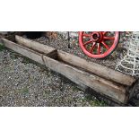 Two weathered vintage pine feeding troughs a/f, each approx. 310 cm x 39 cm x 27 cm h (4)