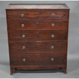A Victorian mahogany country house chest of five long graduated drawers with brass back-plate and