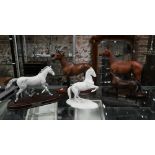 Two Royal Doulton racehorses - One Man DA266 and Red Rum to/w a Beswick example, Arkle, a Levade