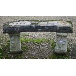 A weathered three piece cast stone garden bench, 110 cm w x 40 cm x 45 cm h