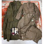 Vintage uniform for a captain in the Royal Army Dental Corps, comprising Great Coat Dismounted