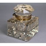 Heavy cut glass inkwell with gilt brass hinged collar, 9cm square