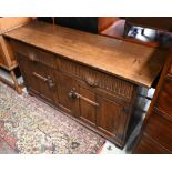 An Old Charm style oak sideboard, probably by Jack Grimble, 136 x 42 x 76 cm h