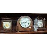 Three mantel clocks