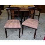 A set of six Victorian style matching bar back dining side chairs with patterned overstuffed