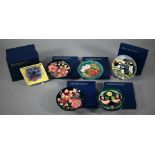 Five Moorcroft boxed circular pin-dishes, including Puffins, Strawberry Thief, Cherries, honeysuckle