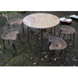 An artisan designed reclaimed agricultural component garden dining set comprising a circular