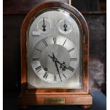 An early 20th century arched mahogany mantel clock, silvered dial 'Aird & Thompson, Glasgow'