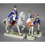 Three Dresden Napoleonic soldier figures - one mounted, 25-20 cm