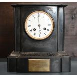 A late 19th century architectural slate mantel clock with twin-train drum movement striking on a