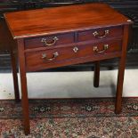 A George III mahogany three drawer side table, with cast gilt-metal fittings, raised on inner-