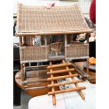 Doll's Asian-style rattan and wicker stilt-house with furniture