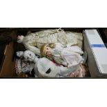 Various reproduction bisque and other dolls, including six boxed Leonardo dolls