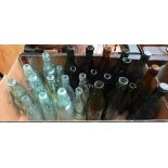 Seven Winchester cod bottles and twenty other Winchester glass bottles (box)