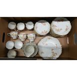 Limoges china part tea service printed with floral design, 35 pieces (box)