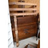 A French carved oak double bedstead