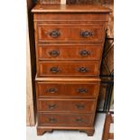 A diminutive reproduction yew chest on chest style six drawer chest, 51 cm w x 37 cm x 115 cm h