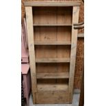 A stained pine open bookcase, with drawer to base - a/f, 78 cm x 20 cm x 178 cm h