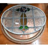 Oval leaded stained glass panel with Art Nouveau stylised floral motif 42 x 55 cm to/w a copper