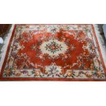 A Chinese cut wool floral design rug, 183 x 122 cm