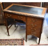 A late 19th/20th century cross-banded satin walnut desk, the leather inset top over a kneehole