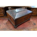 A 19th century rosewood 'sarcophagus' sewing box with egg and dart mouldings and fitted interior, 32