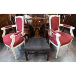 A pair of cream-painted French fauteuille armchairs in the Louis XVI style, dark red chenille fabric