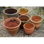 Six assorted weathered terracotta flower pots/garden planters (6)