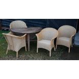 A set of four modern Lloyd Loom chairs to/w a circular teak drop leaf garden table a/f (5)