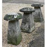 Trio of traditional hand cut staddle stones and caps (3)