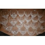 Set of sixteen blown and cut wine glasses, on waisted stems to/w five somewhat similar large serving