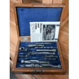 A late 19th century Stanley oak cased draughtsman's set of drawing instruments