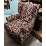 Traditional wingback armchair with Art Nouveau style purple floral upholstery a/f