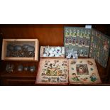 Two Victorian albums of chromolithographic scraps to/w six vintage tin madelaine cake-moulds,