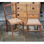 A pair of Edwardian cane seat side chairs (2)
