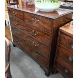 A large 19th century mahogany chest of two short over three long graduating drawers with brass