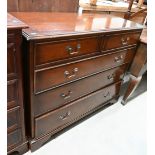 A Georgian style reproduction mahogany chest of two short over three long graduating drawers on