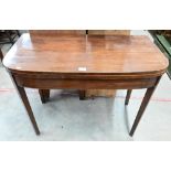 A 19th century mahogany card table, the green baize lined folding top on tapering square supports,