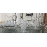 Pair of large cut glass jugs and bowls to/w two cut glass flared vases (one stapled)