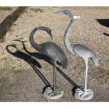 A pair of weathered cast aluminium garden cranes (2)