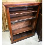 An old open bookcase with adjustable shelves