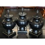 Three heavy ebonised baluster lamp-bases