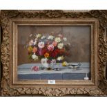 J E Vukovic - Still life study with flowers, oil on board, signed, 28 x 39 cm