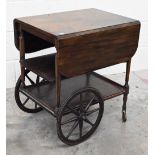 A stained teak Chariot du Boison drinks trolley