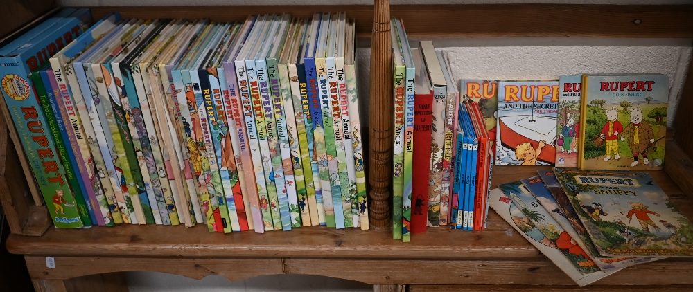 Thirty-four Rupert Bear annuals, mostly 1980s/90s, to/w two facsimile annuals, and related