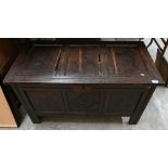 An antique panelled oak coffer 100 cm w x 48 cm d x 56 cm h