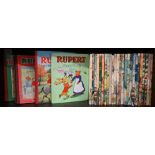 Twenty-nine Rupert Bear annuals and other related volumes, 1940s-1970s