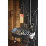 A rivetted forged steel circular hanging kitchen utensil rack