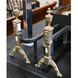 Pair of brass iron fire dogs with urn finials