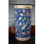 Chinese porcelain cylindrical stick stand with polychrome enamel melons and moths on a blue